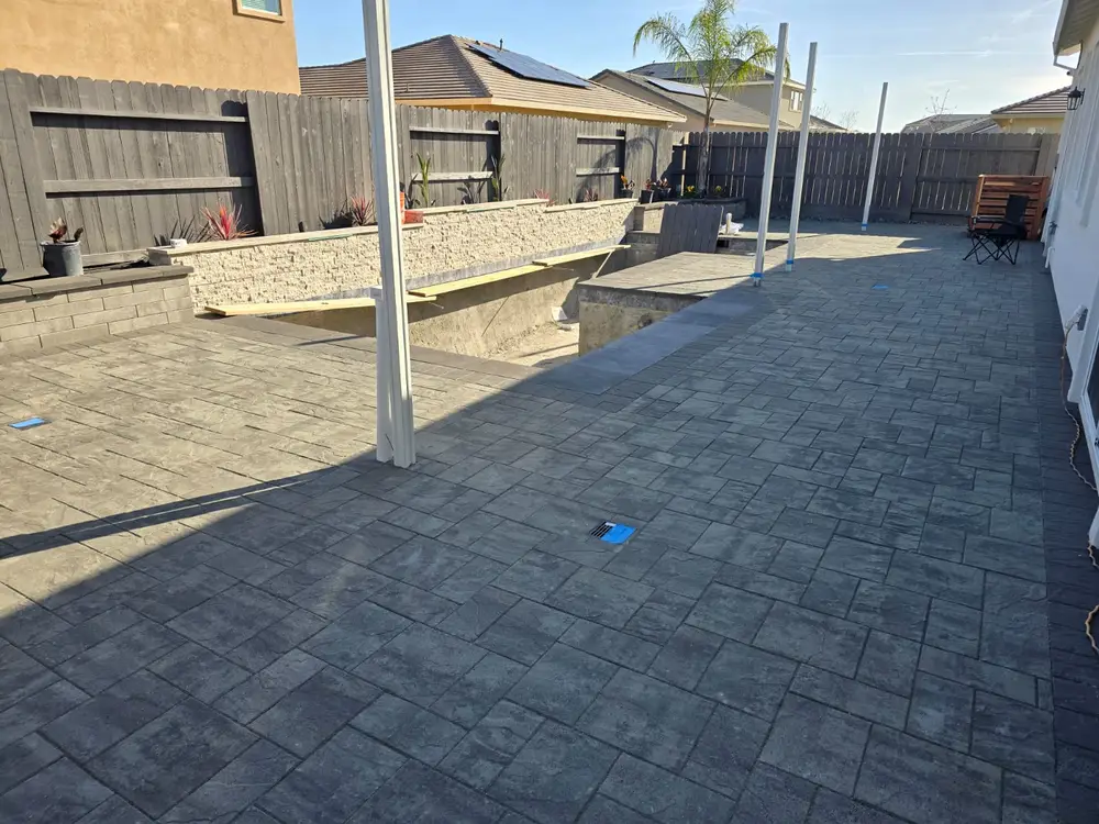 Green Lion paver and porcelain hardscape project photo 12 of 38