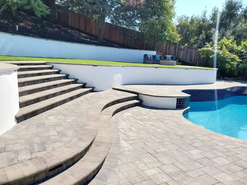 Green Lion paver and porcelain hardscape project photo 16 of 38