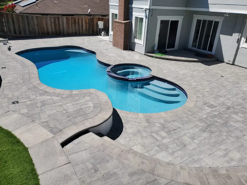 Green Lion paver and porcelain hardscape project photo 17 of 38