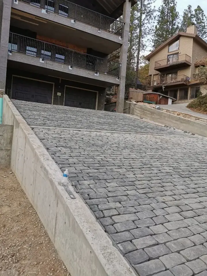 Green Lion paver and porcelain hardscape project photo 28 of 38